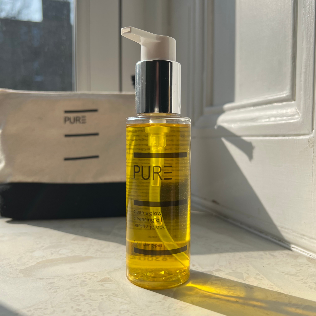 PURE Clean Glow Cleansing Oil bottle – spa-grade natural skincare safe for sensitive skin